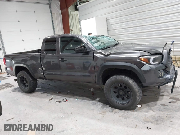 2021 Toyota Tacoma SR with VIN 3TYRX5GN8MT011370, listed as a IAAI auction lot 41287330 with 73,447 mi miles and . Bid and sale history available at DreamBid. Image 13.