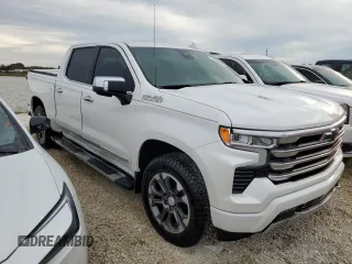 2024 Chevrolet Silverado 1500 High Country with VIN 1GCUDJEL2RZ163370, listed as a Copart auction lot 77587014 with Not Provided miles and Salvage Title. Bid and sale history available at DreamBid. Image 4.