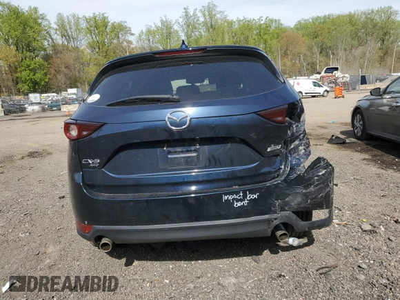 2019 Mazda CX-5 Touring with VIN JM3KFBCM6K0591608, listed as a Copart auction lot 53518385 with 61,618 mi miles and Salvage Title. Bid and sale history available at carsss.com. Image 6.