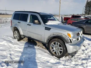 2010 Dodge Nitro Heat with VIN 1D4PU4GK5AW175296, listed as a Copart auction lot 87819235 with 168,542 mi miles and Clean title. Bid and sale history available at DreamBid. Image 4.