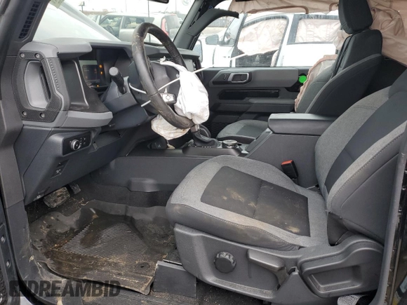 2023 Ford Bronco with VIN 1FMDE5AH6PLB56147, listed as a Copart auction lot 85275394 with 24,594 mi miles and Salvage title. Bid and sale history available at DreamBid. Image 7.