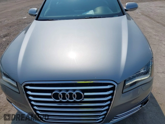 2013 Audi A8 4.0L with VIN WAUA2AFD5DN021950, listed as a IAAI auction lot 42472512 with 126,964 mi miles and . Bid and sale history available at DreamBid. Image 6.