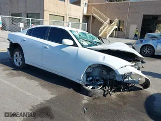 2017 Dodge Charger SE with VIN 2C3CDXBG4HH541360, listed as a IAAI auction lot 41624326 with 130,515 mi miles. Bid and sale history available at carsss.com. Image 1.