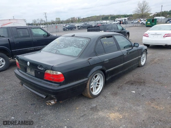 2001 BMW 7 Series 740iA with VIN WBAGG83461DN87920, listed as a IAAI auction lot 41932224 with 1 mi miles. Bid and sale history available at carsss.com. Image 4.