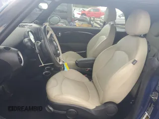 2015 MINI Convertible S with VIN WMWZP3C59F2A91231, listed as a Copart auction lot 59296415 with 31,642 mi miles and Salvage title. Bid and sale history available at DreamBid. Image 7.