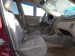 2001 Nissan Sentra GXE z VIN 3N1CB51D11L420105, wystawiony jako IAAI lot #42344077 z przebiegiem 228 870 mil mil oraz . Historia ofert i sprzedaży dostępna na DreamBid. Obrazek 5.