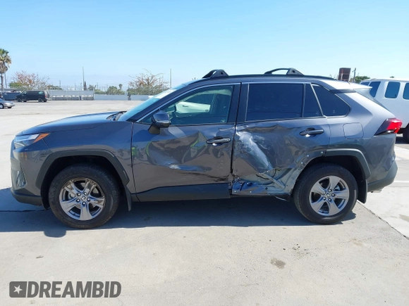 2024 Toyota RAV4 Hybrid LE with VIN JTMMWRFV0RD248035, listed as a IAAI auction lot 42339244 with 18,317 mi miles and . Bid and sale history available at DreamBid. Image 6.
