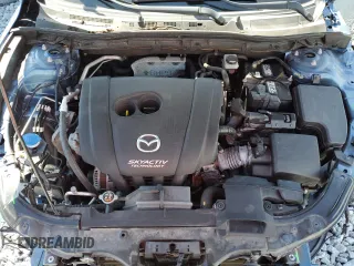 2017 Mazda 3 Touring z VIN JM1BN1L7XH1102372, wystawiony jako Copart lot #61180195 z przebiegiem 57 606 mil mil oraz Szkoda całkowita • Salvage title. Historia ofert i sprzedaży dostępna na DreamBid. Obrazek 11.