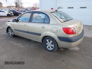 2009 Kia Rio SX with VIN KNADE223196512461, listed as a IAAI auction lot 41520063 with 132,558 mi miles. Bid and sale history available at carsss.com. Image 3.