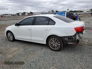 2014 Volkswagen Jetta TDI w/Premium/Nav with VIN 3VWLL7AJ0EM332476, listed as a Copart auction lot 50069445 with 153,974 mi miles and Salvage title. Bid and sale history available at DreamBid. Image 2.