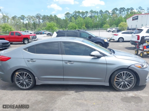 2018 Hyundai Elantra Sport with VIN KMHD04LB0JU597002, listed as a IAAI auction lot 41983087 with 95,583 mi miles. Bid and sale history available at carsss.com. Image 13.