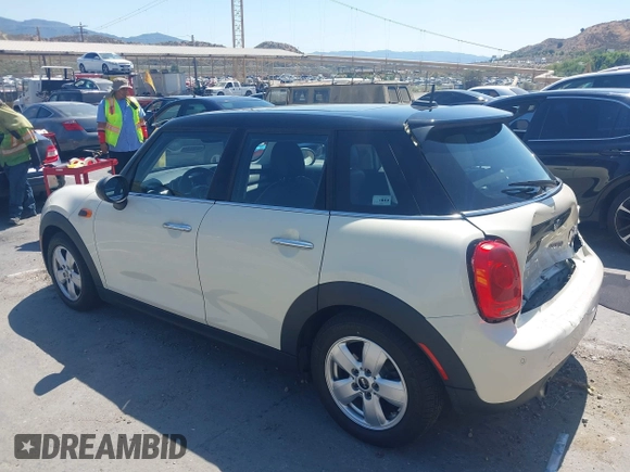 2016 MINI Hardtop 4 Door with VIN WMWXU1C56G2D10605, listed as a IAAI auction lot 42411431 with 35,367 mi miles and . Bid and sale history available at DreamBid. Image 3.