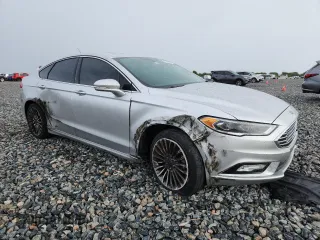 2018 Ford Fusion Titanium with VIN 3FA6P0D91JR207051, listed as a Copart auction lot 59539135 with 204,017 mi miles and Salvage title. Bid and sale history available at DreamBid. Image 4.