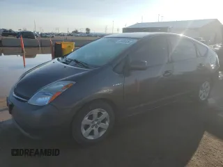2007 Toyota Prius z VIN JTDKB20U973229612, wystawiony jako Copart lot #61403635 z przebiegiem 162 396 mil mil oraz Czysty tytuł • Clean title. Historia ofert i sprzedaży dostępna na DreamBid. Obrazek 1.
