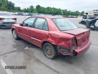 2002 Mazda Protege DX z VIN JM1BJ225821586258, wystawiony jako IAAI lot #42366064 z przebiegiem 167 332 mil mil oraz . Historia ofert i sprzedaży dostępna na DreamBid. Obrazek 3.