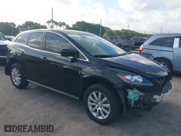 2010 Mazda CX-7 Sport with VIN JM3ER2W51A0310645, listed as a IAAI auction lot 41948890 with 139,777 mi miles. Bid and sale history available at carsss.com. Image 1.