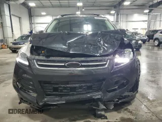 2015 Ford Escape Titanium with VIN 1FMCU9J96FUA43340, listed as a Copart auction lot 55756395 with 142,039 mi miles and Salvage Title. Bid and sale history available at DreamBid. Image 5.