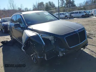 2019 Bentley Bentayga V8 z VIN SJAAM2ZV9KC024576, wystawiony jako IAAI lot #41713477 z przebiegiem 29 631 mil mil oraz . Historia ofert i sprzedaży dostępna na DreamBid. Obrazek 13.