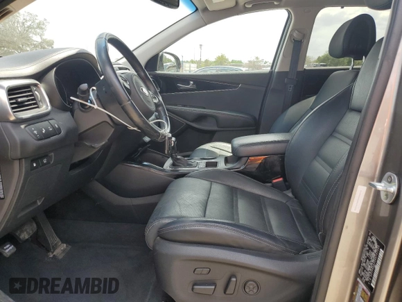2016 Kia Sorento SX z VIN 5XYPKDA52GG141330, wystawiony jako Copart lot #55448425 z przebiegiem 78 330 mil mil oraz Szkoda całkowita • Salvage title. Historia ofert i sprzedaży dostępna na DreamBid. Obrazek 7.
