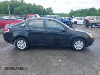 2009 Ford Focus S z VIN 1FAHP34N09W220485, wystawiony jako IAAI lot #42249397 z przebiegiem 68 869 mil mil oraz . Historia ofert i sprzedaży dostępna na DreamBid. Obrazek 13.
