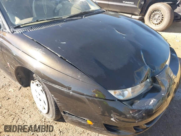 1997 Saturn SC z VIN 1G8ZE1283VZ163658, wystawiony jako IAAI lot #40494467 z przebiegiem 111 701 mil mil oraz . Historia ofert i sprzedaży dostępna na DreamBid. Obrazek 6.