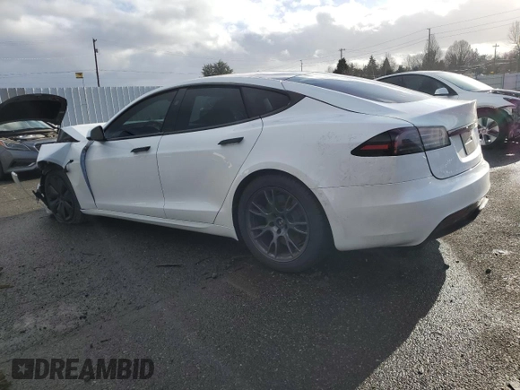 2024 Tesla Model S с VIN 5YJSA1E59RF541014, выставлен на аукционе Copart как лот 86646114 с пробегом 7 404 миль миль и Списание • Salvage title. История ставок и продаж доступна на DreamBid. Изображение 2.