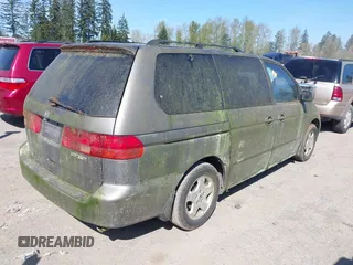 2000 Honda Odyssey EX with VIN 2HKRL1863YH008265, listed as a IAAI auction lot 42041096 with 157,694 mi miles and . Bid and sale history available at DreamBid. Image 4.