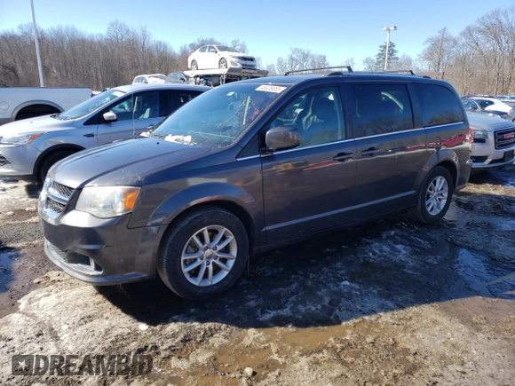 2018 Dodge Grand Caravan SXT with VIN 2C4RDGCGXJR325632, listed as a Copart auction lot 46326655 with 128,692 mi miles and Clean Title. Bid and sale history available at DreamBid. Image 1.