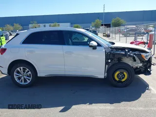 2022 Audi Q3 S line Premium z VIN WA1DECF32N1148121, wystawiony jako IAAI lot #42304046 z przebiegiem 19 547 mil mil oraz . Historia ofert i sprzedaży dostępna na DreamBid. Obrazek 14.