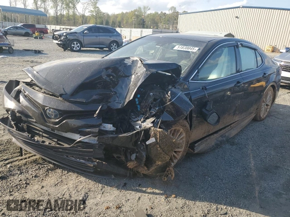 2019 Toyota Camry Hybrid LE z VIN 4T1B21HK2KU519539, wystawiony jako Copart lot #51830045 z przebiegiem Nie podano mil oraz Szkoda całkowita • Salvage title. Historia ofert i sprzedaży dostępna na DreamBid. Obrazek 1.