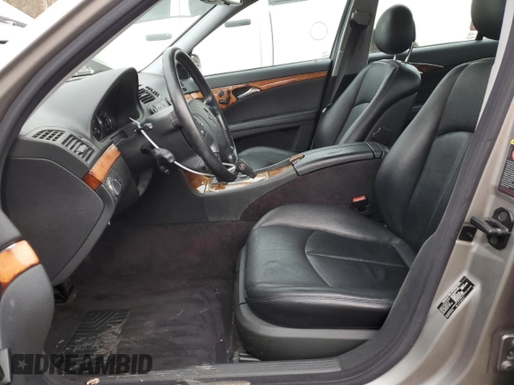 2003 Mercedes-Benz E 320 with VIN WDBUF65J23A297936, listed as a Copart auction lot 80877004 with 214,478 mi miles and Salvage Title. Bid and sale history available at DreamBid. Image 7.