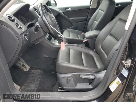2017 Volkswagen Tiguan S with VIN WVGBV7AX8HK007434, listed as a Copart auction lot 53706165 with 164,588 mi miles and Salvage Title. Bid and sale history available at DreamBid. Image 7.