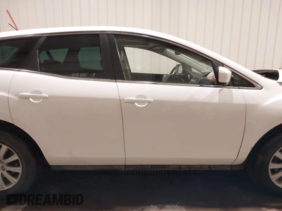2012 Mazda CX-7 i Touring z VIN JM3ER2C51C0411837, wystawiony jako IAAI lot #42023100 z przebiegiem 85 112 mil mil oraz . Historia ofert i sprzedaży dostępna na DreamBid. Obrazek 14.