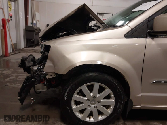 2014 Chrysler Town & Country Touring with VIN 2C4RC1BG3ER295722, listed as a IAAI auction lot 41705820 with 142,587 mi miles and . Bid and sale history available at DreamBid. Image 20.