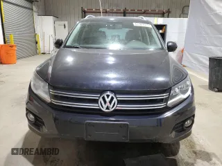 2012 Volkswagen Tiguan SE with VIN WVGBV7AX2CW525234, listed as a Copart auction lot 61307915 with 123,938 mi miles and Clean title. Bid and sale history available at DreamBid. Image 5.