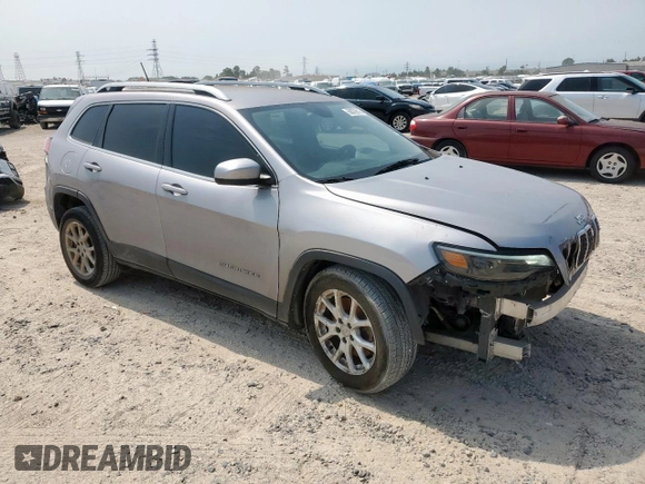 2019 Jeep Cherokee Latitude with VIN 1C4PJLCB2KD332429, listed as a Copart auction lot 58076815 with 124,958 mi miles and Salvage title. Bid and sale history available at DreamBid. Image 4.