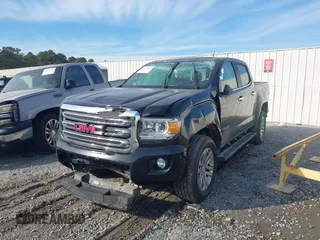 2015 GMC Canyon 2WD SLT with VIN 1GTG5CE38F1247533, listed as a IAAI auction lot 41369019 with 94,443 mi miles. Bid and sale history available at carsss.com. Image 2.
