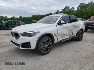 2023 BMW X6 xDrive40i z VIN 5UXCY6C0XP9P66570, wystawiony jako Copart lot #57805645 z przebiegiem Nie podano mil oraz Szkoda całkowita • Salvage title. Historia ofert i sprzedaży dostępna na DreamBid. Obrazek 1.
