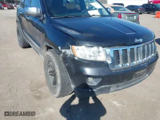 2011 Jeep Grand Cherokee Laredo with VIN 1J4RR4GG2BC585859, listed as a IAAI auction lot 41901919 with 272,585 mi miles. Bid and sale history available at carsss.com. Image 6.