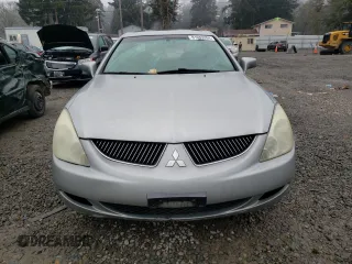 2004 Mitsubishi Diamante LS z VIN 6MMAP67P34T003796, wystawiony jako Copart lot #81683284 z przebiegiem 127 882 mil mil oraz Szkody całkowita. Historia ofert i sprzedaży dostępna na DreamBid. Obrazek 5.