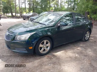 2014 Chevrolet Cruze 1LT with VIN 1G1PC5SB9E7156806, listed as a IAAI auction lot 42813826 with 140,573 mi miles and . Bid and sale history available at DreamBid. Image 2.