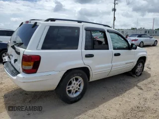 2002 Jeep Grand Cherokee Laredo z VIN 1J4GX48SX2C292081, wystawiony jako Copart lot #54246255 z przebiegiem 167 082 mil mil oraz Szkoda całkowita • Salvage title. Historia ofert i sprzedaży dostępna na DreamBid. Obrazek 3.