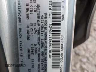 2011 Mazda Mazda3 i Touring with VIN JM1BL1VG9B1480628, listed as a Copart auction lot 52808535 with 151,168 mi miles and Salvage Title. Bid and sale history available at carsss.com. Image 12.