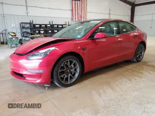 2022 Tesla Model 3 Long Range with VIN 5YJ3E1EBXNF285779, listed as a Copart auction lot 54630135 with 129,097 mi miles and Clean Title. Bid and sale history available at DreamBid. Image 1.