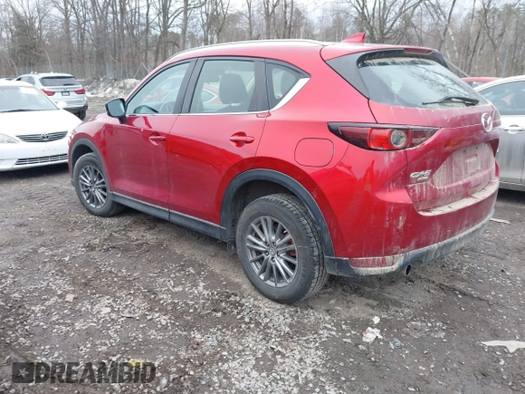 2018 Mazda CX-5 Sport with VIN JM3KFBBM0J0451246, listed as a IAAI auction lot 41698535 with 172,513 mi miles. Bid and sale history available at carsss.com. Image 3.