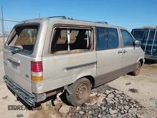1992 Ford Aerostar with VIN 1FMDA31XXNZB36114, listed as a IAAI auction lot 41873163 with 209,452 mi miles. Bid and sale history available at carsss.com. Image 4.