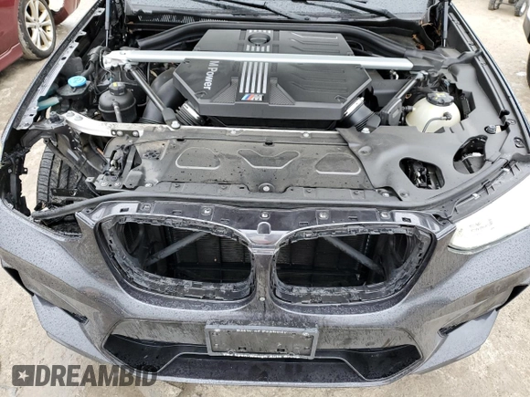 2021 BMW X3 M with VIN 5YMTS0C03M9F04458, listed as a Copart auction lot 42162245 with 52,156 mi miles and Salvage title. Bid and sale history available at DreamBid. Image 12.