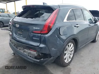 2019 Cadillac XT4 AWD Luxury with VIN 1GYFZBR41KF160352, listed as a IAAI auction lot 42047477 with 58,850 mi miles and . Bid and sale history available at DreamBid. Image 6.