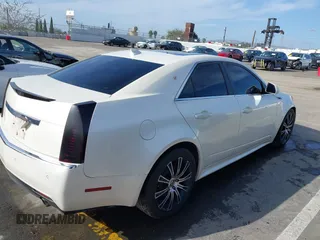 2010 Cadillac CTS with VIN 1G6DK5EVXA0102844, listed as a IAAI auction lot 41818267 with 127,517 mi miles and . Bid and sale history available at DreamBid. Image 4.