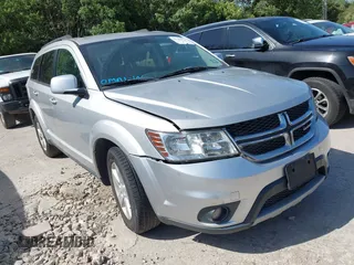 2012 Dodge Journey SXT z VIN 3C4PDCBG0CT214220, wystawiony jako IAAI lot #42797576 z przebiegiem 174 565 mil mil oraz . Historia ofert i sprzedaży dostępna na DreamBid. Obrazek 1.